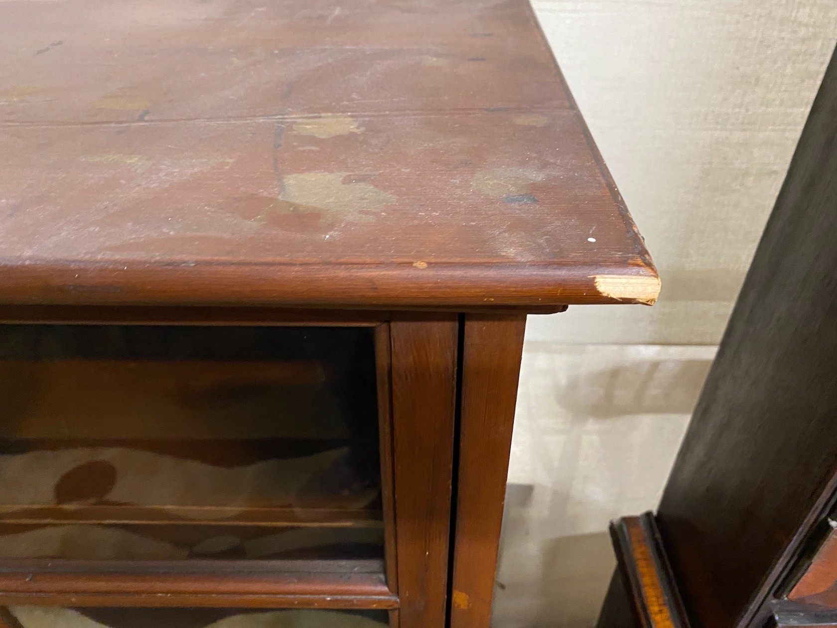 An early 20th century pine sliding door cabinet, width 129cm, depth 38cm, height 125cm